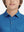 Front view of youth wearing blue graffiti performance print boys golf polo, showing collar and chest fit