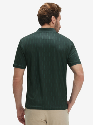Back upper body shot of model wearing green palm leaves stylish full print contrast collared golf polo shirts