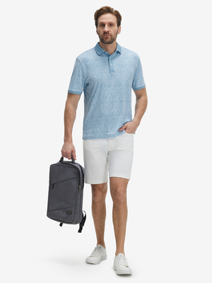 Front full body shot of model wearing white blue abstract stylish full print contrast collared golf polo shirts