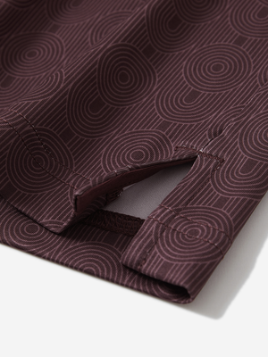 Detail view of hem on dark red lines stylish full print contrast collared golf polo shirts