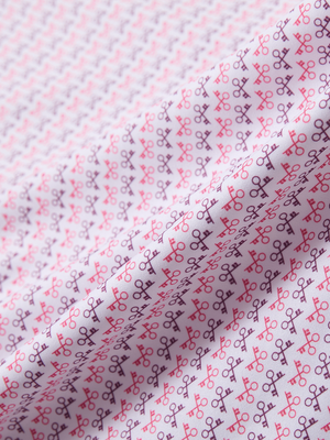 Close-up texture of keys pattern stylish full print contrast collared golf polo shirts fabric showing weave detail.