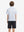 Back upper view of Stylish print boys polo shirts with clean lines and white golf tone