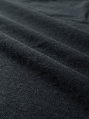 Clear close-up of exquisite jacquard fabric grain and nylon blend texture, nylon blend casual jacquard polo shirts in dark gray